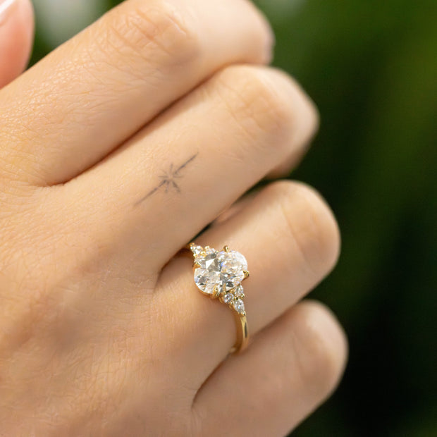 Freya Oval Cut Lab Grown Diamond Solitaire Engagement Ring With Fancy Trefoil Shoulders 18ct Yellow Gold 1.50ct