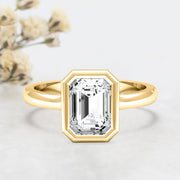 Noah James Jewellers Manchester Engagement Ring Alyssa Emerald Cut Rubover Solitaire Engagement Ring Yellow Gold Lab Grown Diamond Moissanite
