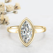 Noah James Jewellers Manchester Engagement Ring Alyssa Marquise Cut Rubover Solitaire Engagement Ring Yellow Gold Lab Grown Diamond Moissanite