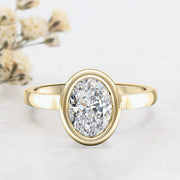 Noah James Jewellers Manchester Engagement Ring Alyssa Oval Cut Rubover Solitaire Engagement Ring Yellow Gold Lab Grown Diamond Moissanite