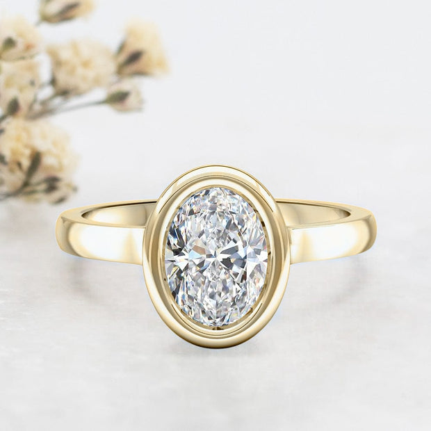 Noah James Jewellers Manchester Engagement Ring Alyssa Oval Cut Rubover Solitaire Engagement Ring Yellow Gold Lab Grown Diamond Moissanite