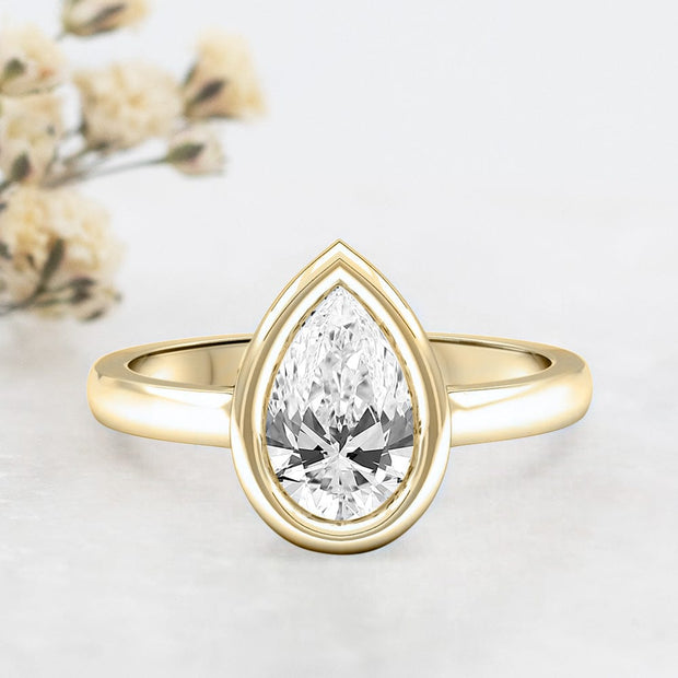 Noah James Jewellers Manchester Engagement Ring Alyssa Pear Shape Rubover Solitaire Engagement Ring Yellow Gold Lab Grown Diamond Moissanite