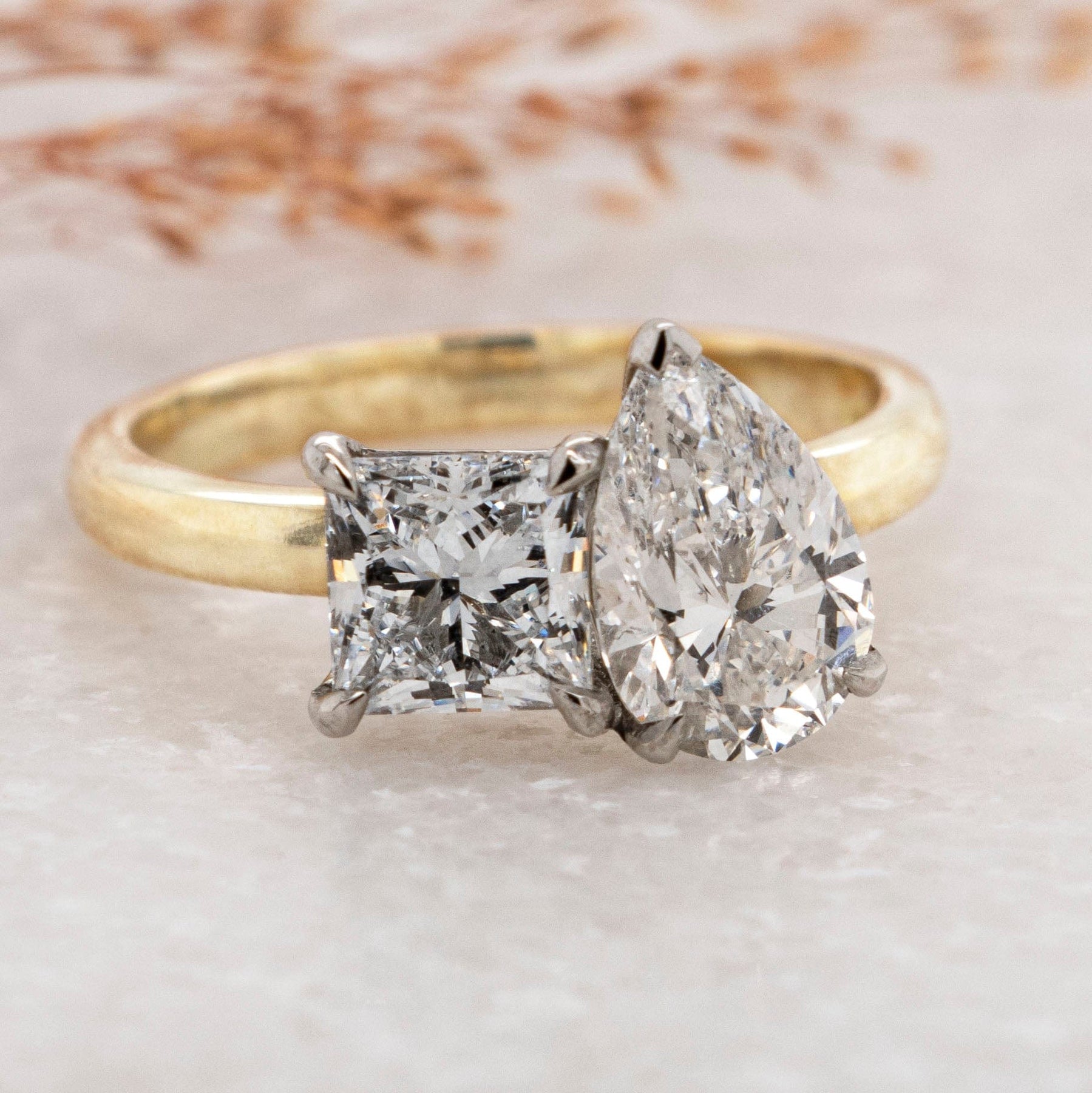 BESPOKE TOI ET MOI PEAR AND PRINCESS CUT ENGAGEMENT RING