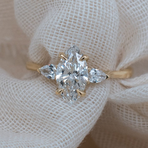 Noah James Jewellers Manchester In Stock Engagement Ring Flora Marquise and Pear Shaped 3 Stone Lab Grown Diamond Engagement Ring Yellow Gold Lab Grown Diamond Moissanite