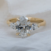 Noah James Jewellers Manchester In Stock Engagement Ring Flora Oval and Pear Shaped 3 Stone Lab Grown Diamond Engagement Ring 2ct Yellow Gold Lab Grown Diamond Moissanite