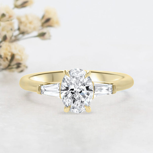 Noah James Jewellers Manchester Engagement Ring Iris Oval Cut and Tapered Baguette Engagement Ring Yellow Gold Lab Grown Diamond Moissanite