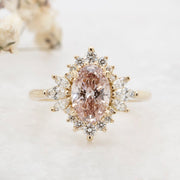 Noah James Jewellers Manchester In Stock Engagement Ring Luella Oval Cut Peachy Pink Lab Grown Diamond Engagement Ring with fancy cluster halo 18ct yellow gold 1.30ct Lab Grown Diamond Moissanite