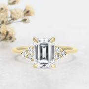 Noah James Jewellers Manchester Engagement Ring Margot Emerald Cut and Round Brilliant Cut Trefoil Shoulder Engagement Ring Yellow Gold Lab Grown Diamond Moissanite
