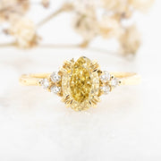 Noah James Jewellers Manchester In Stock Engagement Ring Margot Oval Cut Yellow Lab Grown Diamond Engagement Ring With Trefoil Shoulders 18ct yellow gold 1.50ct Lab Grown Diamond Moissanite