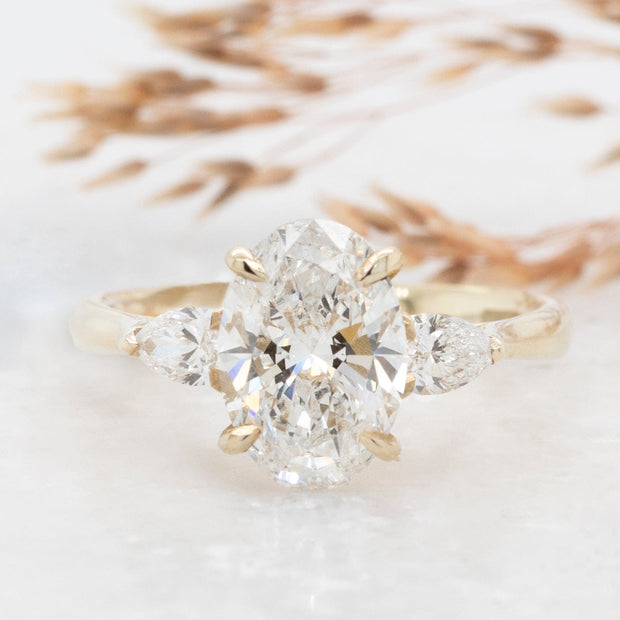 Noah James Jewellers Manchester In Stock Engagement Ring Flora Oval and Pear Shaped 3 Stone Lab Grown Diamond Engagement Ring 18ct Yellow Gold 2ct Lab Grown Diamond Moissanite