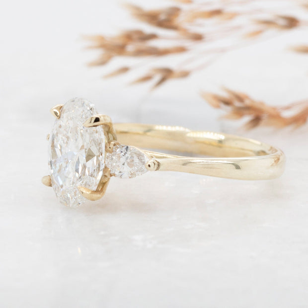 Noah James Jewellers Manchester In Stock Engagement Ring Flora Oval and Pear Shaped 3 Stone Lab Grown Diamond Engagement Ring 18ct Yellow Gold 2ct Lab Grown Diamond Moissanite