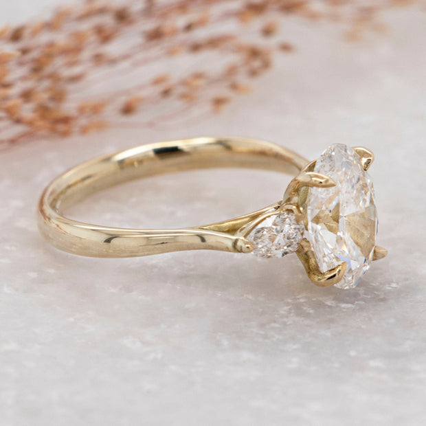 Noah James Jewellers Manchester In Stock Engagement Ring Flora Oval and Pear Shaped 3 Stone Lab Grown Diamond Engagement Ring 2ct Yellow Gold Lab Grown Diamond Moissanite