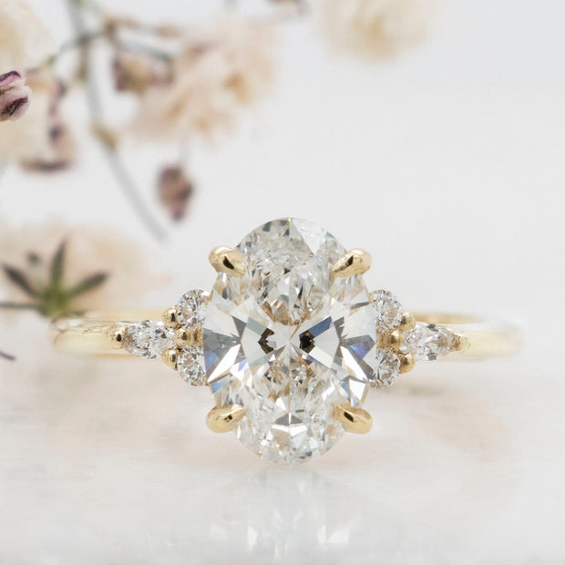 Noah James Jewellers Manchester In Stock Engagement Ring Freya Oval Cut Lab Grown Diamond Solitaire Engagement Ring With Fancy Trefoil Shoulders 1.50ct Yellow Gold Lab Grown Diamond Moissanite
