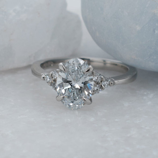 Noah James Jewellers Manchester In Stock Engagement Ring Margot Oval Cut Lab Grown Diamond Solitaire Engagement Ring With Trefoil Shoulders 1.50ct Lab Grown Diamond Moissanite