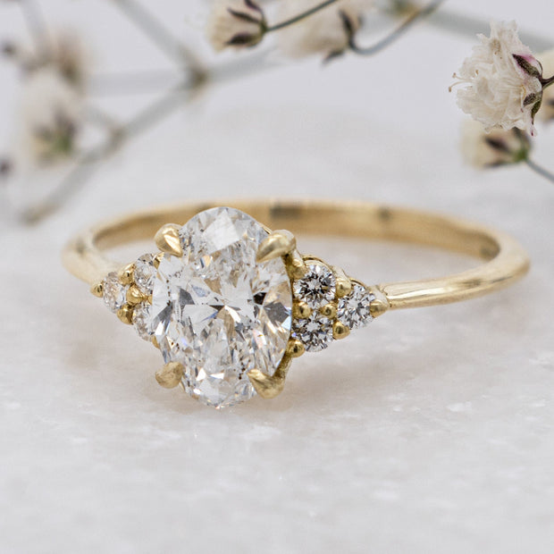 Noah James Jewellers Manchester In Stock Engagement Ring Margot Oval Cut Trefoil Shoulder Lab Grown Diamond Engagement Ring 1.00ct Yellow Gold Lab Grown Diamond Moissanite