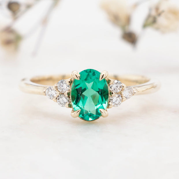 Noah James Jewellers Manchester In Stock Engagement Ring Margot Oval Cut Trefoil Shoulder Lab Grown Emerald Engagement Ring 1.00ct Yellow Gold Lab Grown Diamond Moissanite