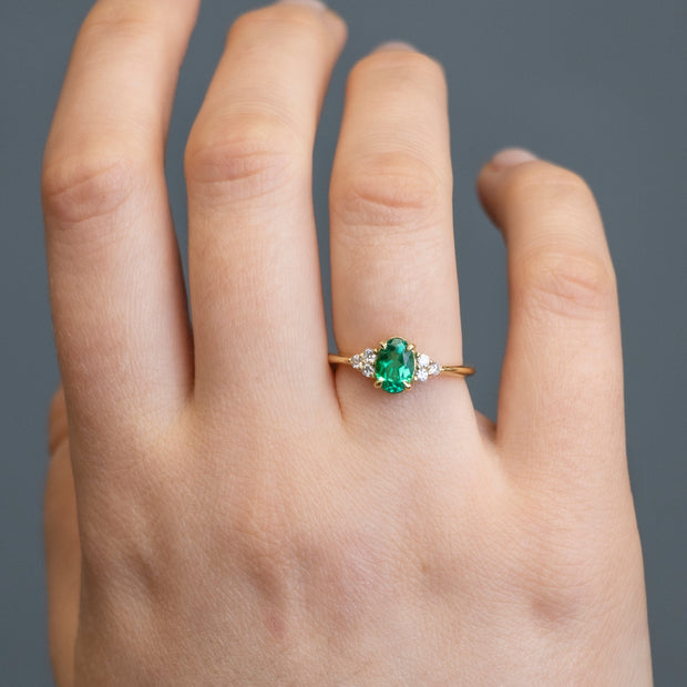 Noah James Jewellers Manchester In Stock Engagement Ring Margot Oval Cut Trefoil Shoulder Lab Grown Emerald Engagement Ring 1.00ct Yellow Gold Lab Grown Diamond Moissanite