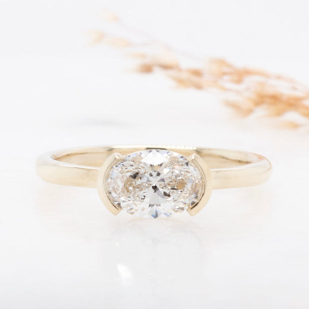 Noah James Jewellers Manchester In Stock Engagement Ring Paloma Oval Cut East West Semi Rubover Set Lab Grown Diamond Solitaire Engagement Ring Yellow Gold - 1ct Lab Grown Diamond Moissanite