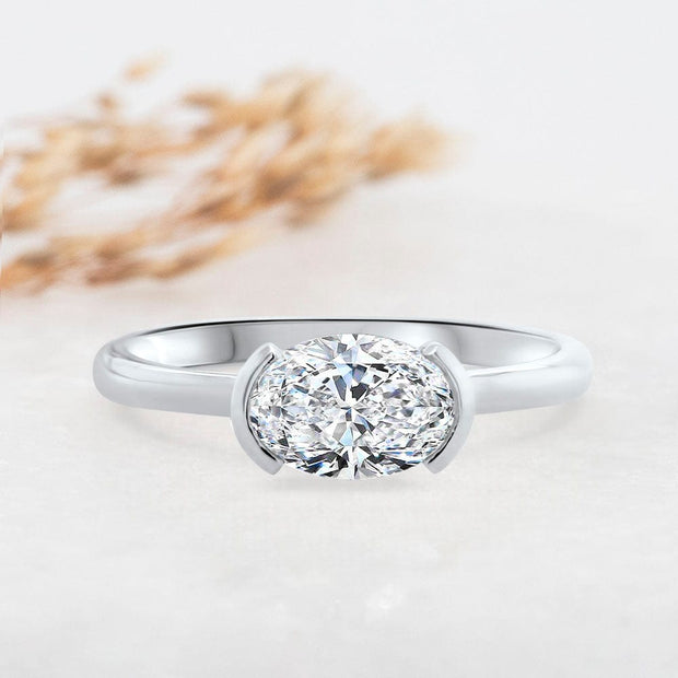 Noah James Jewellers Manchester Engagement Ring Paloma Oval Cut Half Bezel Set Solitaire Engagement Ring Platinum Lab Grown Diamond Moissanite
