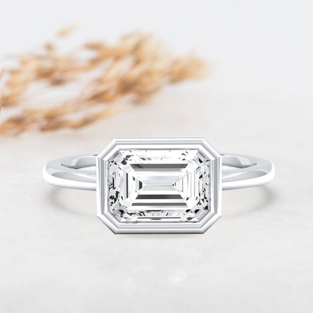 Noah James Jewellers Manchester Engagement Ring Rosa Emerald Cut East West Rubover Solitaire Engagement Ring Platinum Lab Grown Diamond Moissanite