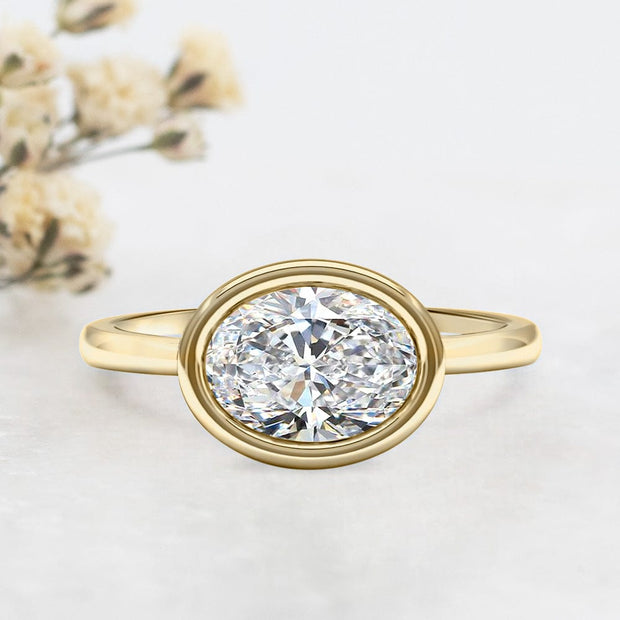 Noah James Jewellers Manchester Engagement Ring Rosa Oval Cut East West Rubover Solitaire Engagement Ring Yellow Gold Lab Grown Diamond Moissanite