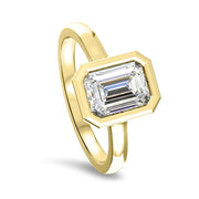 Alyssa Emerald Cut Rubover Solitaire Engagement Ring Yellow Gold | Noah James Jewellery.