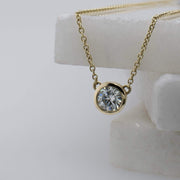 Alyssa Round Brilliant Cut Moissanite Rubover Set Pendant 9ct Yellow Gold | Noah James Jewellery.
