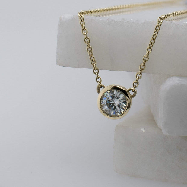 Alyssa Round Brilliant Cut Moissanite Rubover Set Pendant 9ct Yellow Gold | Noah James Jewellery.