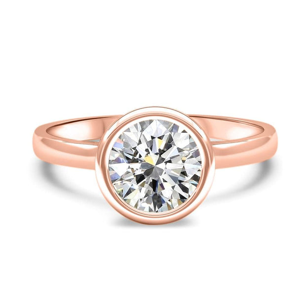 Alyssa Round Brilliant Cut Rubover Solitaire Engagement Ring Platinum | Noah James Jewellery.