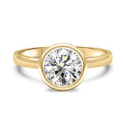 Alyssa Round Brilliant Cut Rubover Solitaire Engagement Ring Platinum | Noah James Jewellery.