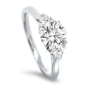 Aquila Round Brilliant and Trilliant Cut Engagement Ring Platinum | Noah James Jewellery.