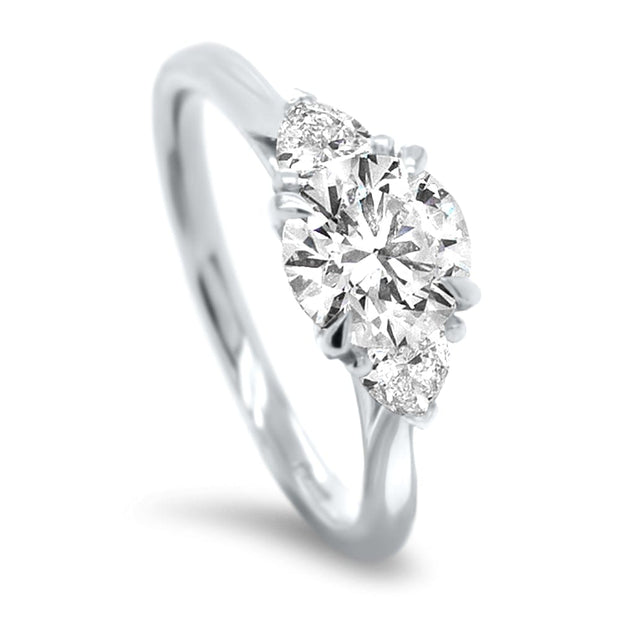 Aquila Round Brilliant and Trilliant Cut Engagement Ring Platinum | Noah James Jewellery.