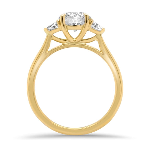 Aquila Round Brilliant and Trilliant Cut Engagement Ring Yellow Gold | Noah James Jewellery.