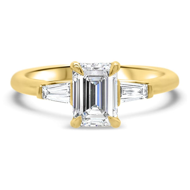 Iris Emerald Cut and Tapered Baguette Engagement Ring Yellow Gold | Noah James Jewellery.
