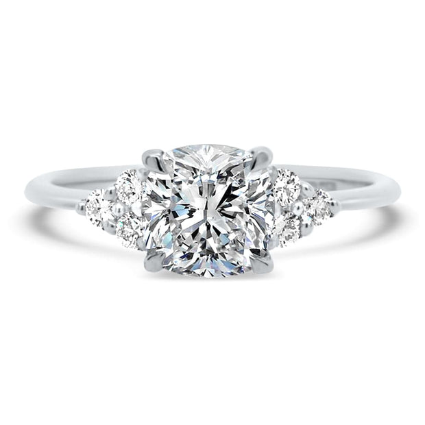 Margot Cushion and Round Brilliant Cut Trefoil Shoulder Engagement Ring Platinum | Noah James Jewellery.
