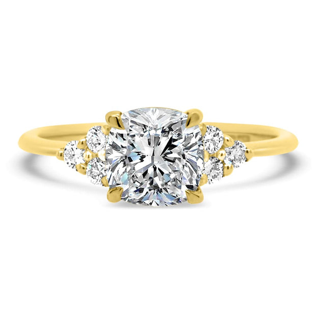 Margot Cushion and Round Brilliant Cut Trefoil Shoulder Engagement Ring Yellow Gold | Noah James Jewellery.