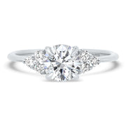 Margot Round Brilliant Cut Trefoil Shoulder Engagement Ring Platinum | Noah James Jewellery.