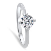 Nina Round Brilliant Cut Solitaire Twist Engagement Ring Platinum | Noah James Jewellery.