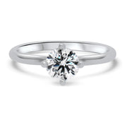 Nina Round Brilliant Cut Solitaire Twist Engagement Ring Platinum | Noah James Jewellery.