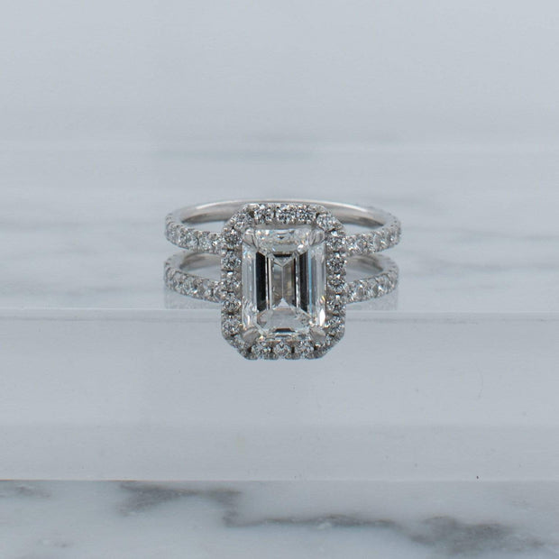 BESPOKE EMERALD CUT DIAMOND HALO ENGAGEMENT RING | Noah James Jewellery.