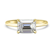 Thalia Emerald Cut East West Claw Set Solitaire Engagement Ring Yellow Gold | Noah James Jewellery.