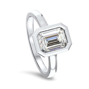 Alyssa Emerald Cut Rubover Solitaire Engagement Ring Platinum | Noah James Jewellery.