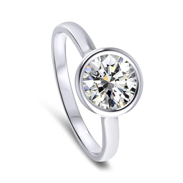 Alyssa Round Brilliant Cut Rubover Solitaire Engagement Ring Platinum | Noah James Jewellery.