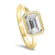 Rosa Emerald Cut East West Rubover Solitaire Engagement Ring Yellow Gold | Noah James Jewellery.
