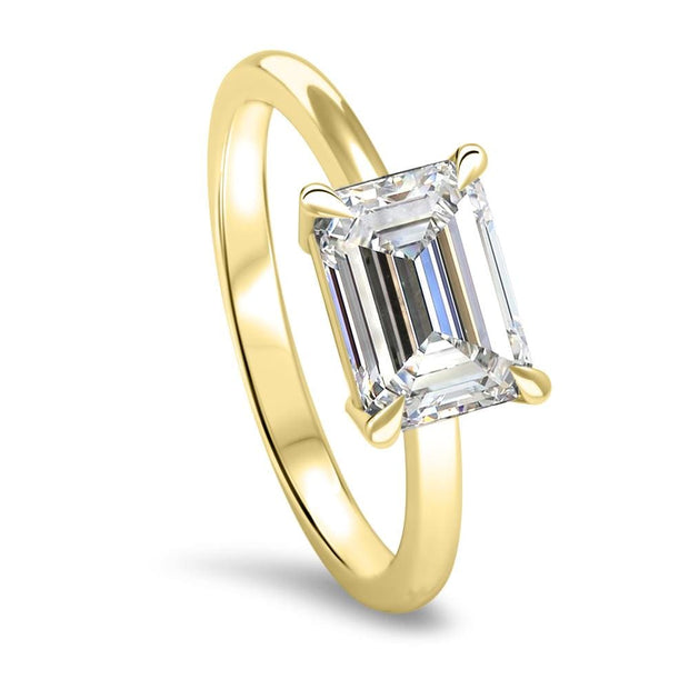 Thalia Emerald Cut East West Claw Set Solitaire Engagement Ring Yellow Gold | Noah James Jewellery.