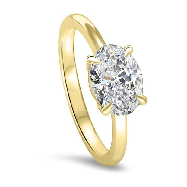 Thalia Oval Cut East West Claw Set Solitaire Engagement Ring Yellow Gold | Noah James Jewellery.