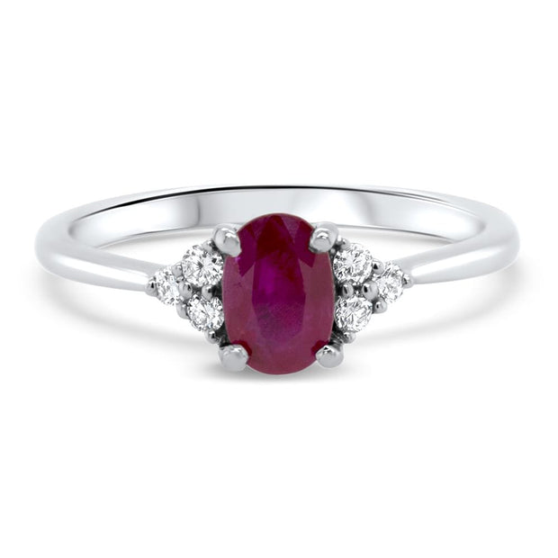 Maia Oval Cut Ruby Ring with Trefoil Diamond Shoulders | Noah James Jewellery.