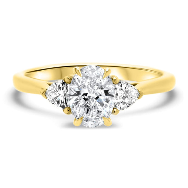 Aquila Oval Cut and Trilliant Cut Engagement Ring Yellow Gold | Noah James Jewellery.