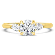 Flora Round Brilliant Cut and Pear Shape Engagement Ring Platinum | Noah James Jewellery.