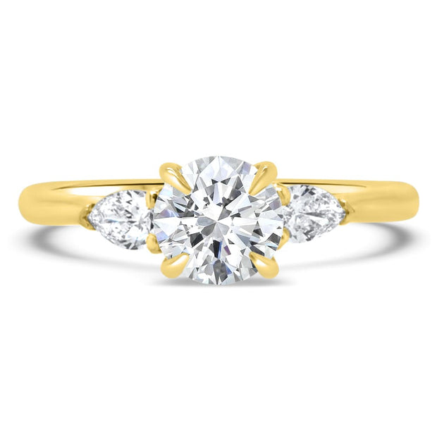 Flora Round Brilliant Cut and Pear Shape Engagement Ring Yellow Gold | Noah James Jewellery.
